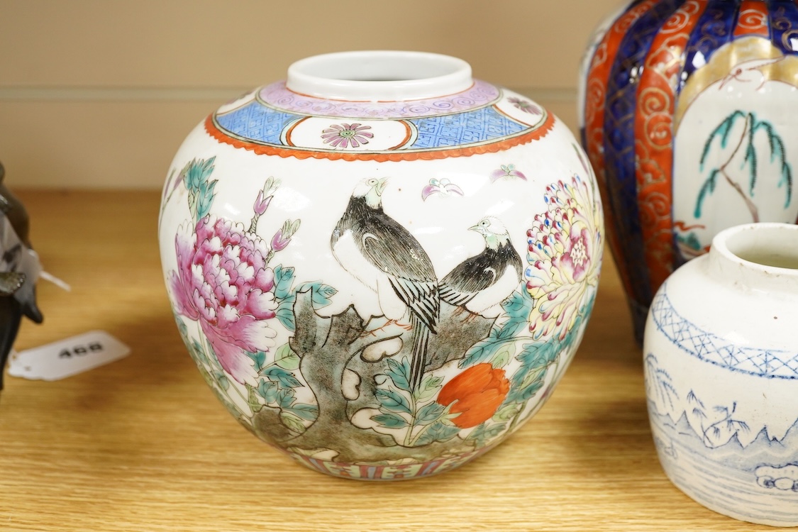 An Imari vase and cover-28cm high, a Chinese jar and prunus vase and a small blue and white jar.